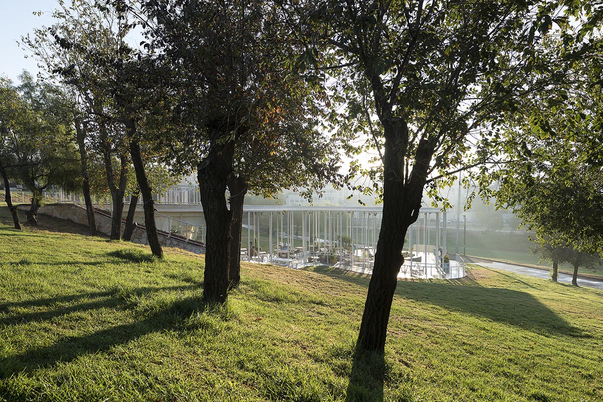 Yaniv Pardo Architects designs open coffee shop with slim columns in idyllic landscape of Jerusalem