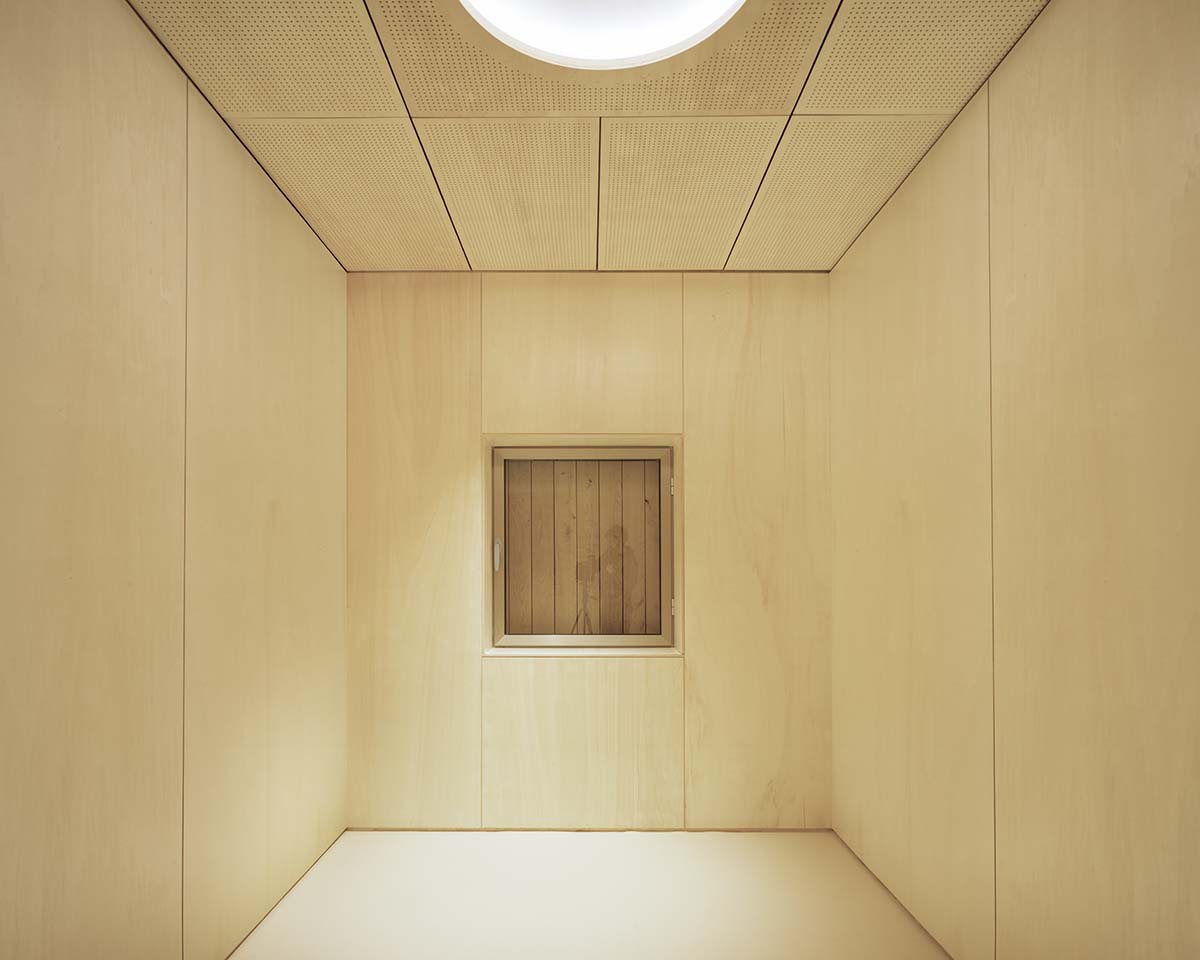 Atelier Delalande Tabourin creates a wooden sunken pavilion that arouses curiosity for visitors