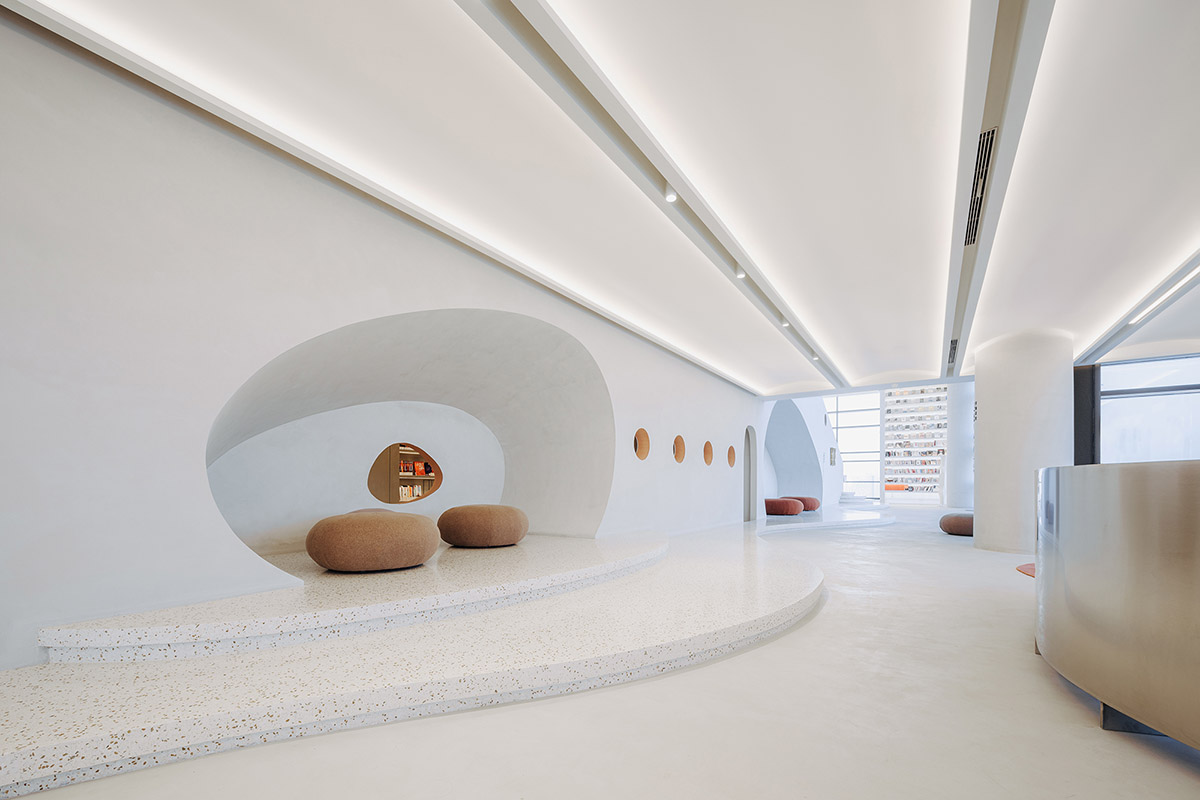 Wutopia Lab creates surprising interiors with cut-out forms in The Satori Harbor Library in Guangzhou