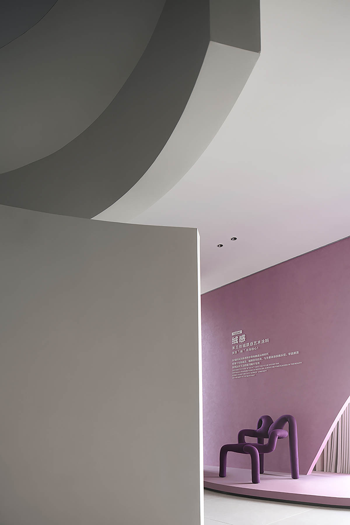 Exhibition hall interiors in China feature unconstrained flowing wall evoking