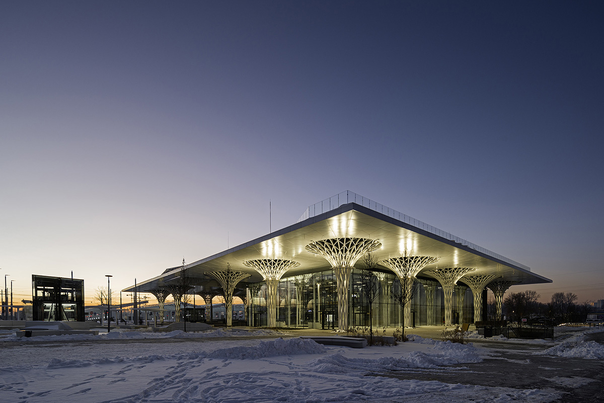 Organic tree-like columns are combined with linear canopy for Metropolitan Station in Lublin 