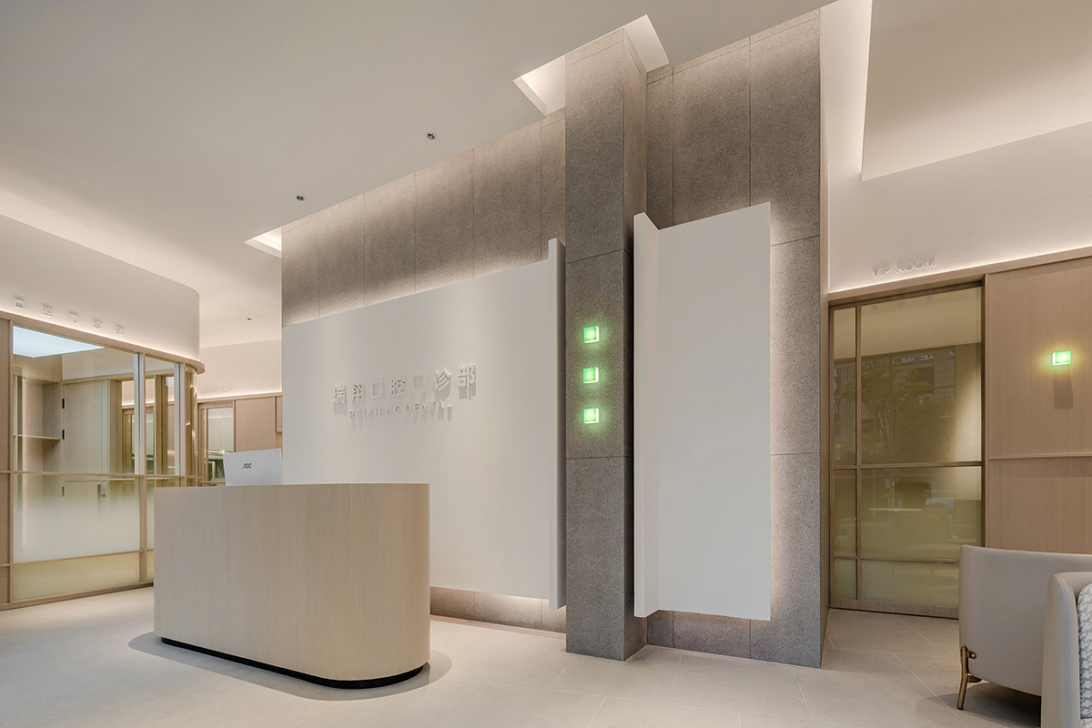 JACKY.W DESIGN completes dental clinic with rounded wooden walls and natural tones in China 
