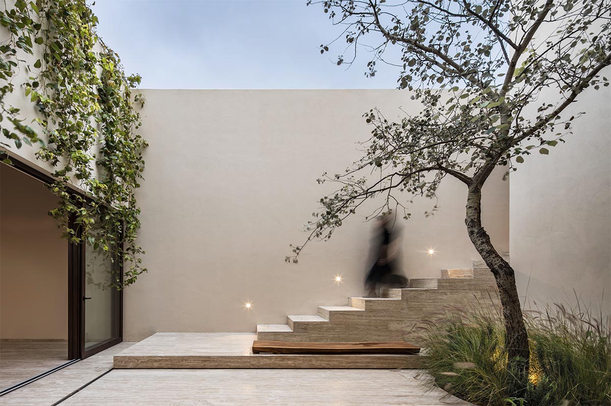 Sabino 10 residence by Editorial features a solid façade with hermetic volumes in Mexico