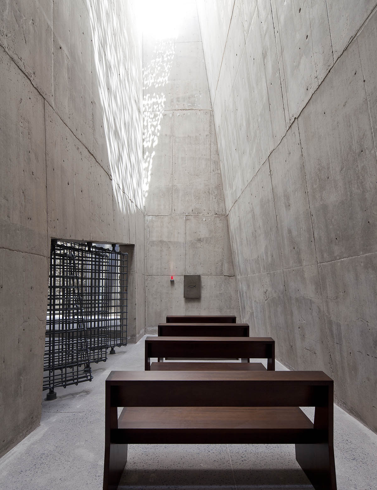 Menis Arquitectos designs church and community centre in Spain with four massive concrete volumes 