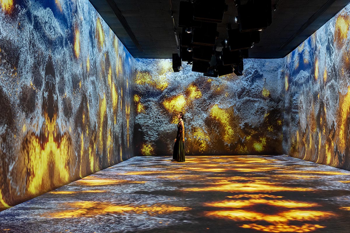 Grey fluid concrete wraps Aatma Manthan Museum by Sanjay Puri Architects