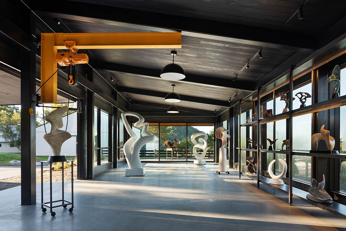 Corten steel artist's studio by Birdseye is enriched by light-filled interior on a valley of Vermont
