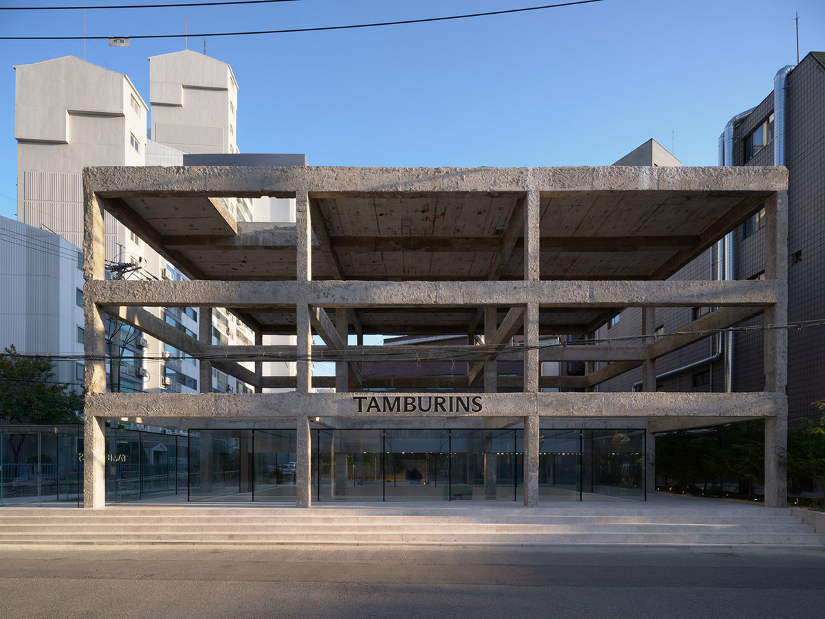 Perfume store by The System Lab shows the beauty of scent with gridded concrete and glass box