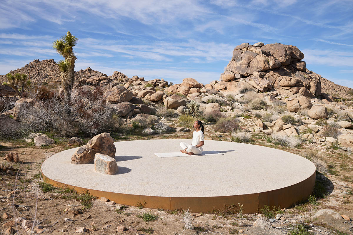 Industry of All Nations built a wooden pavilion in the rugged natural landscape of the Mojave Desert