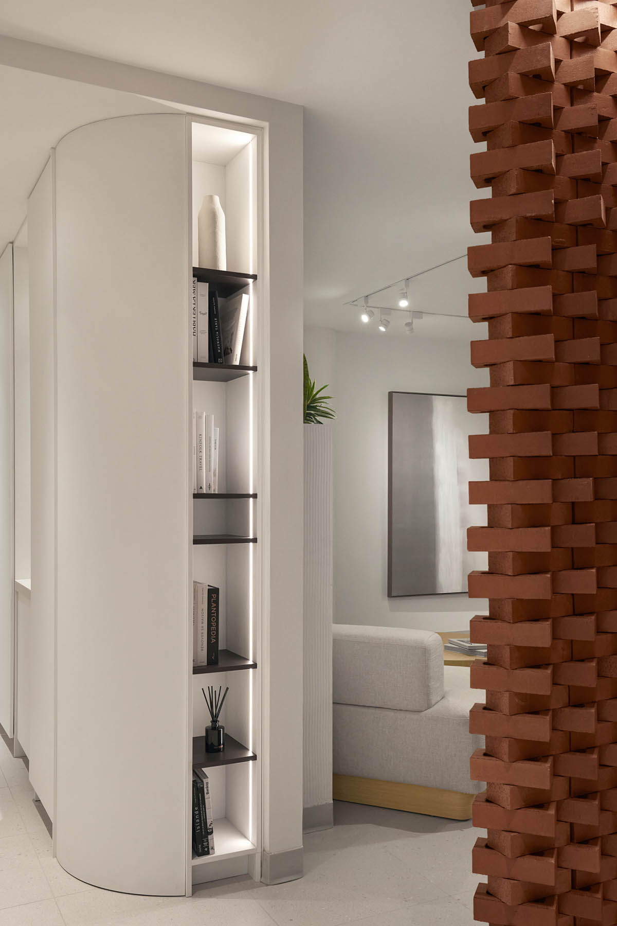 Surgical center features artisanal terracotta brick wall to reverse 
