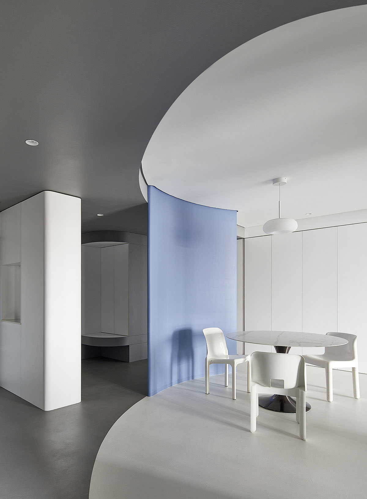 XIGO STUDIO creates gray and blue-colored interiors for apartment in Beijing 