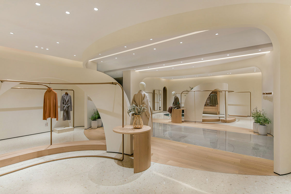 JYDP designs retail space with warm tones and curved walls in Shanghai