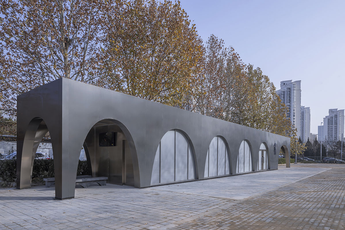 TEMP designs runner's station with stainless steel arcades in Beijing Olympic Forest Park
