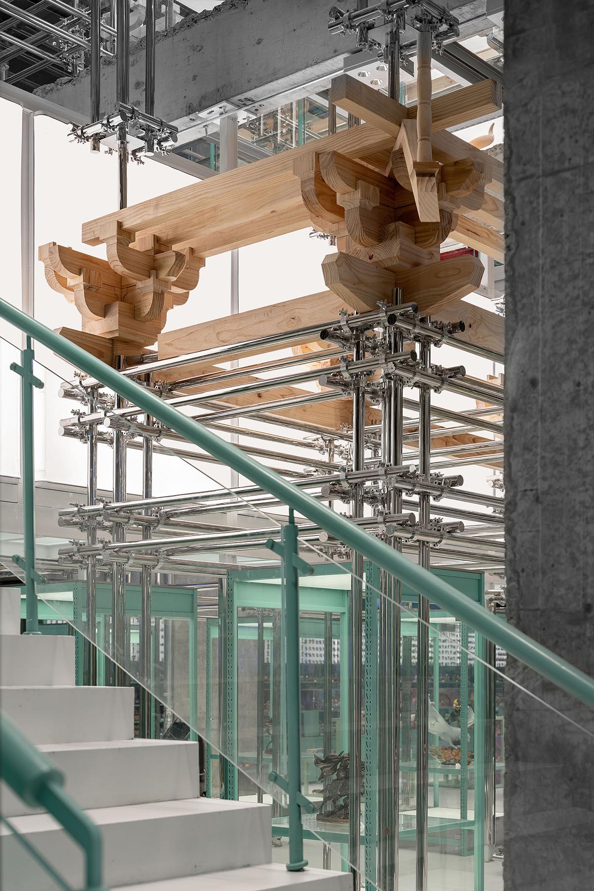 BloomDesign combines stainless steel tubes with timber joints to create retail store in China 