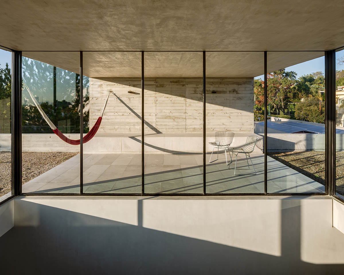 PPAA Arquitectos built compact concrete house with large private terrace in Mexico City