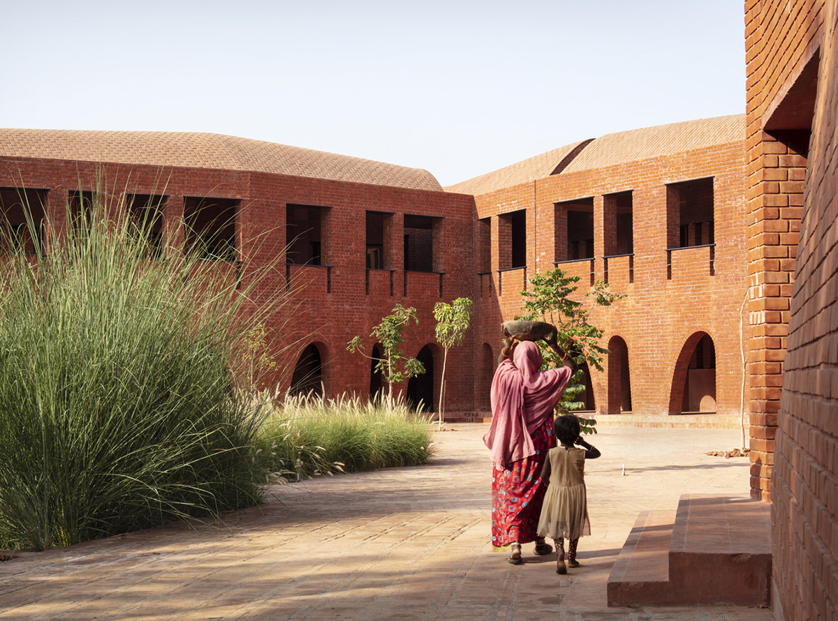 A school built from tilted brick vaults evoke a child's freedom in India