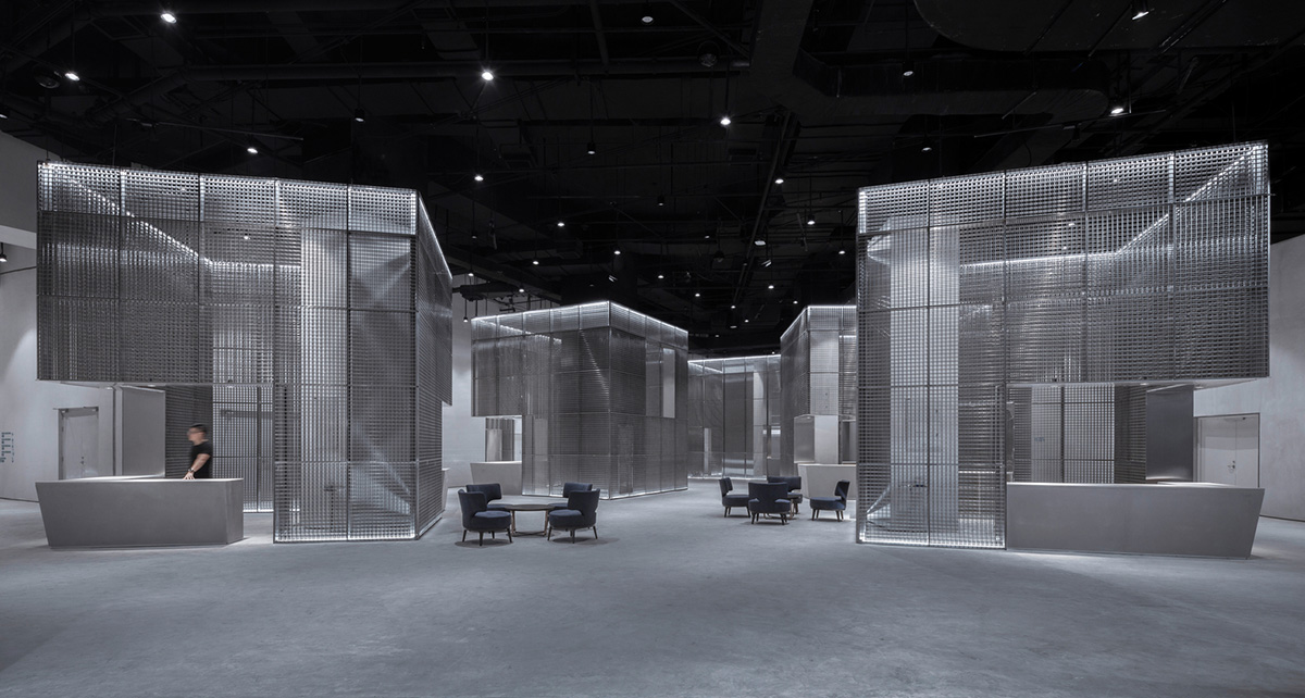 BANDe Architects combines greyscale interior with gridded wooden structures for GreenMonster Lab