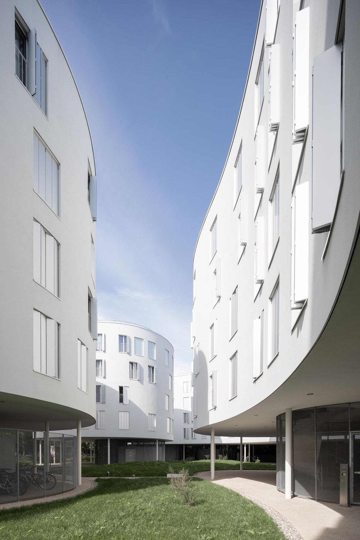 SANAA's social housing complex composed of organic forms in Paris photographed by Vincent Hecht
