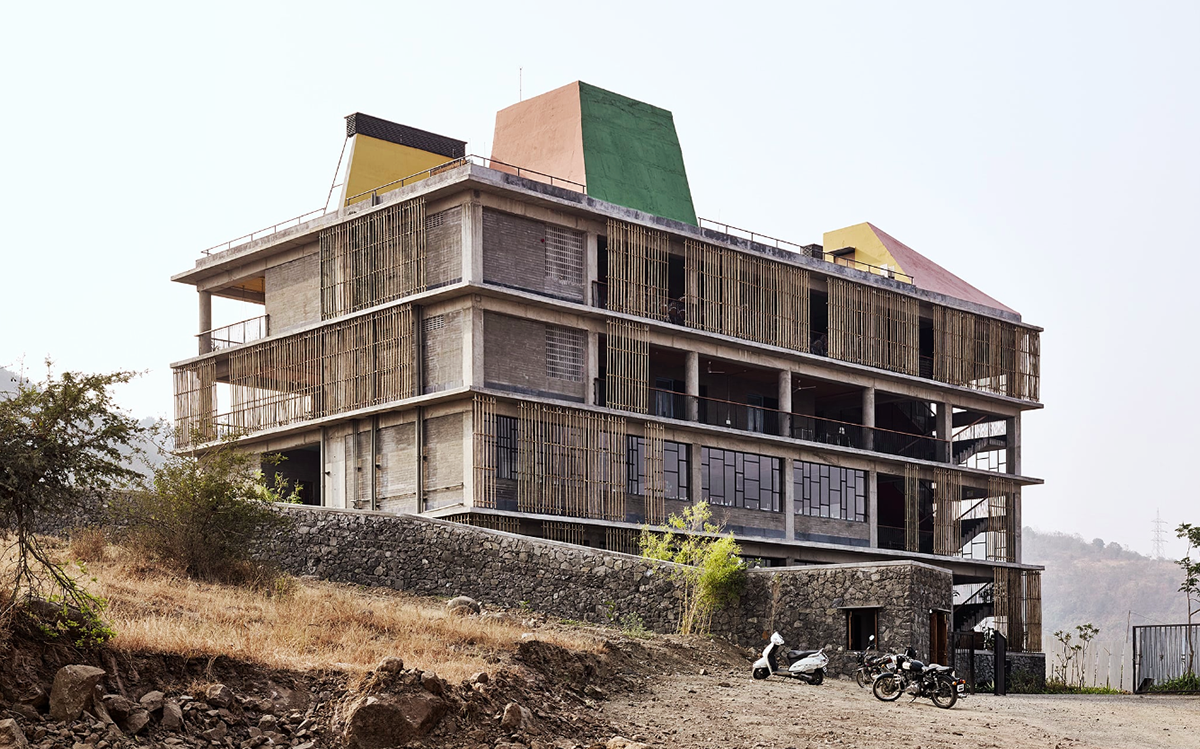 Avasara Academy, resembling an unfinished structure, educates young women in the moorland of Pune