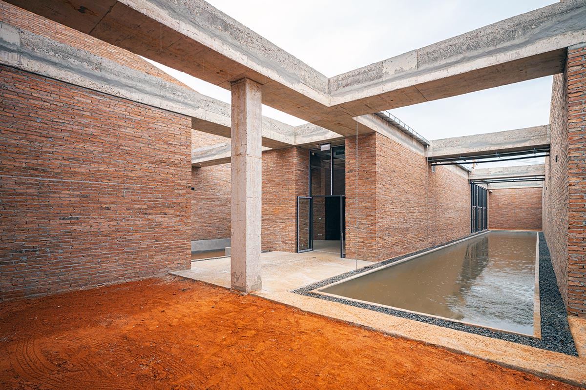 Bangkok Project Studio used over 480,0000 fired clay bricks to form elephant museum with curved walls