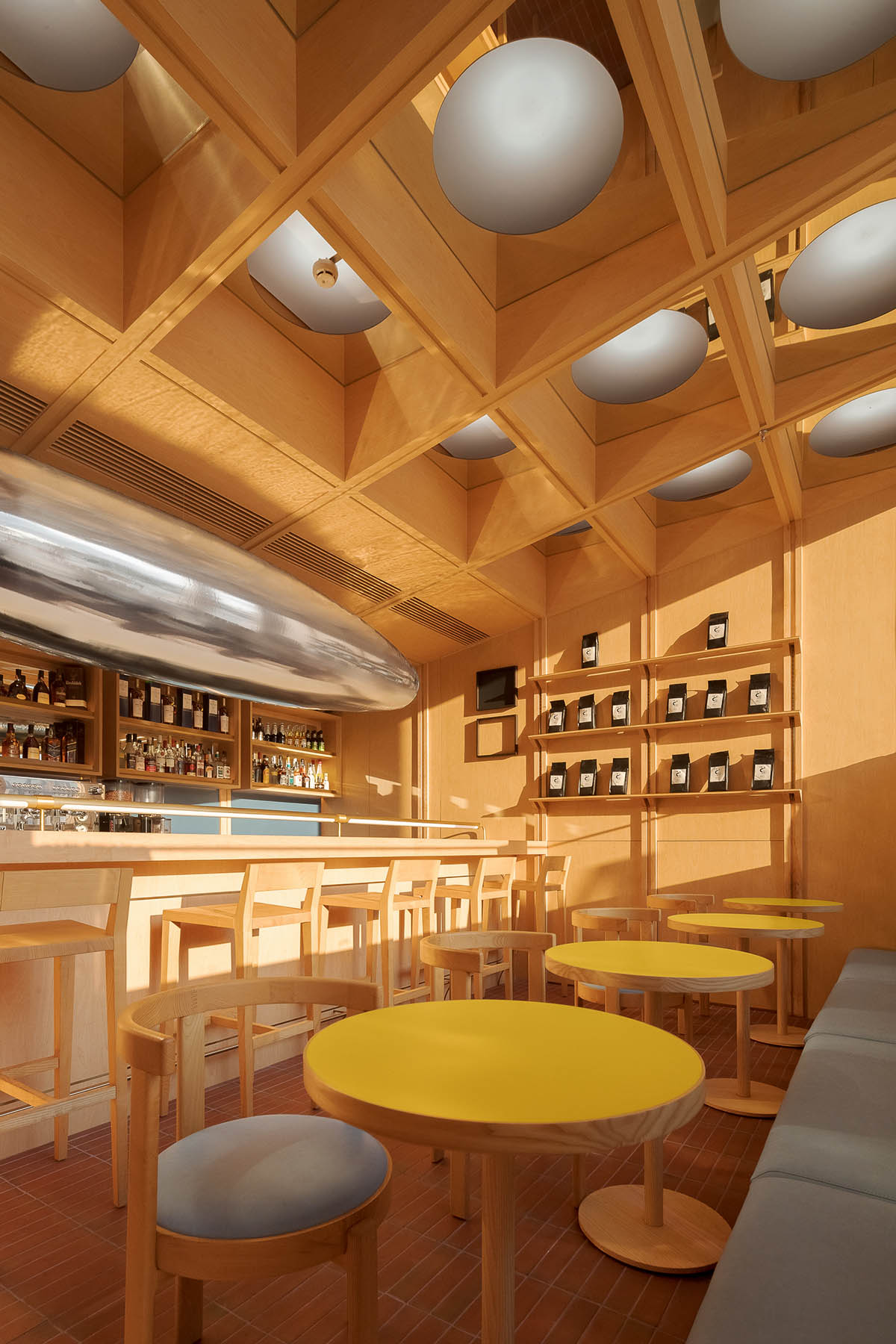Various Associates completes C² Cafe & Bar in Shenzhen with wooden ceiling details