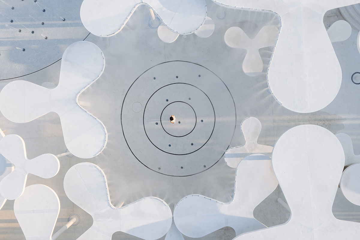 Wutopia Lab creates surreal forest made of 108 white steel columns for sales center in Huzhou