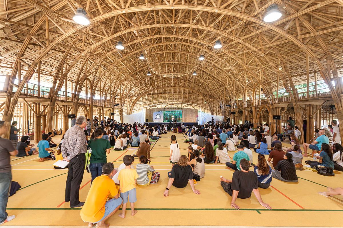 CLA used organic flowing curves with newly invented bamboo trusses for Bamboo Sports Hall in Thailand