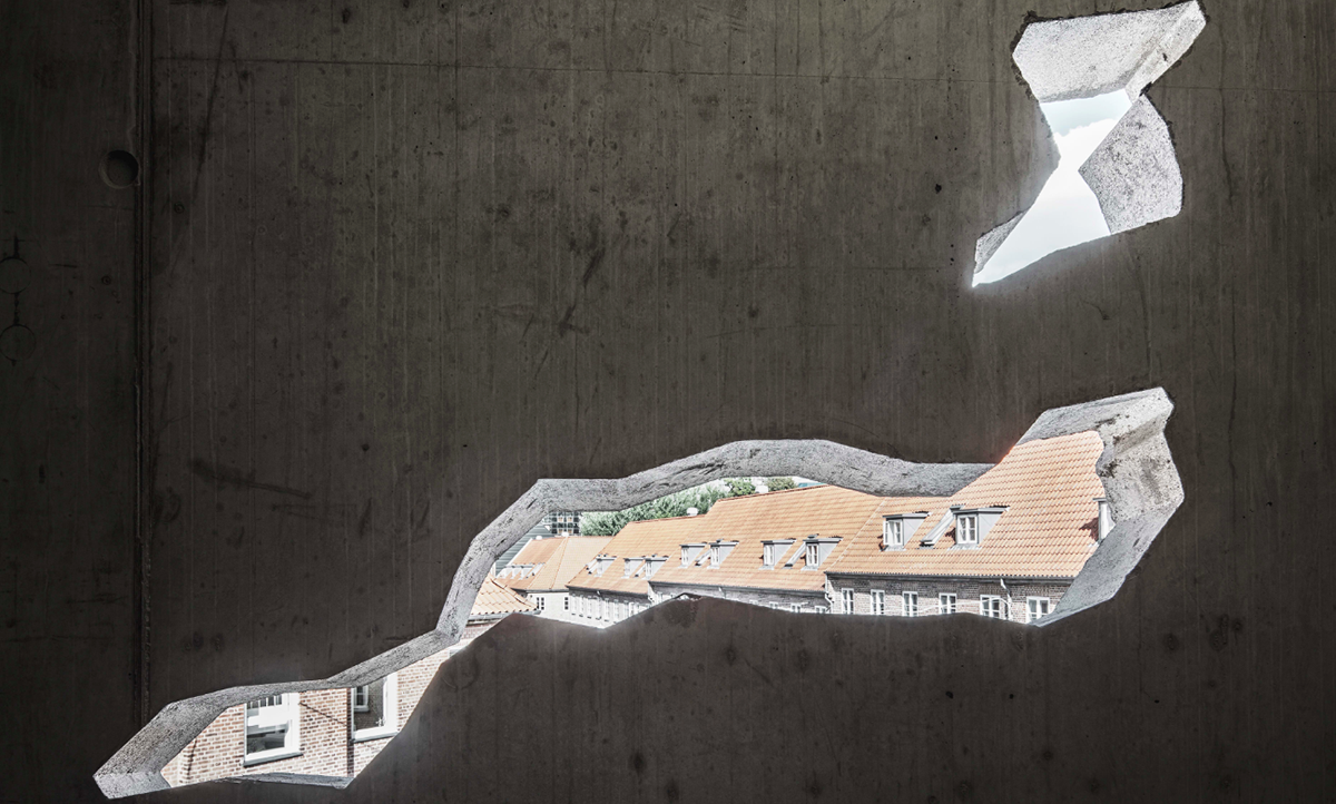 A collage of elements reflecting surroundings assembled on the facade of Office Building by SLETH