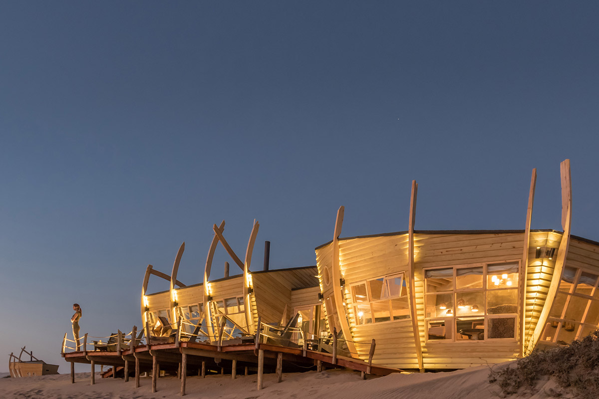 Nina Maritz Architects completes shipwreck-themed timber cabins for travelers in Namibia