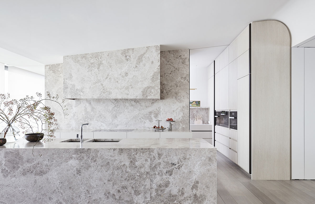 Jolson Architecture and Interiors creates fluid surfaces for interiors of this Melbourne home