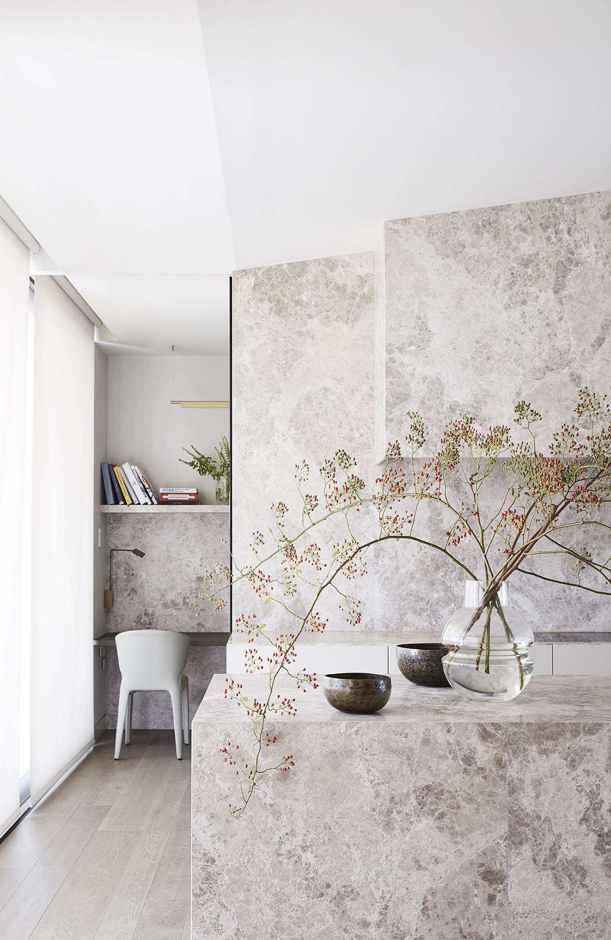 Jolson Architecture and Interiors creates fluid surfaces for interiors of this Melbourne home