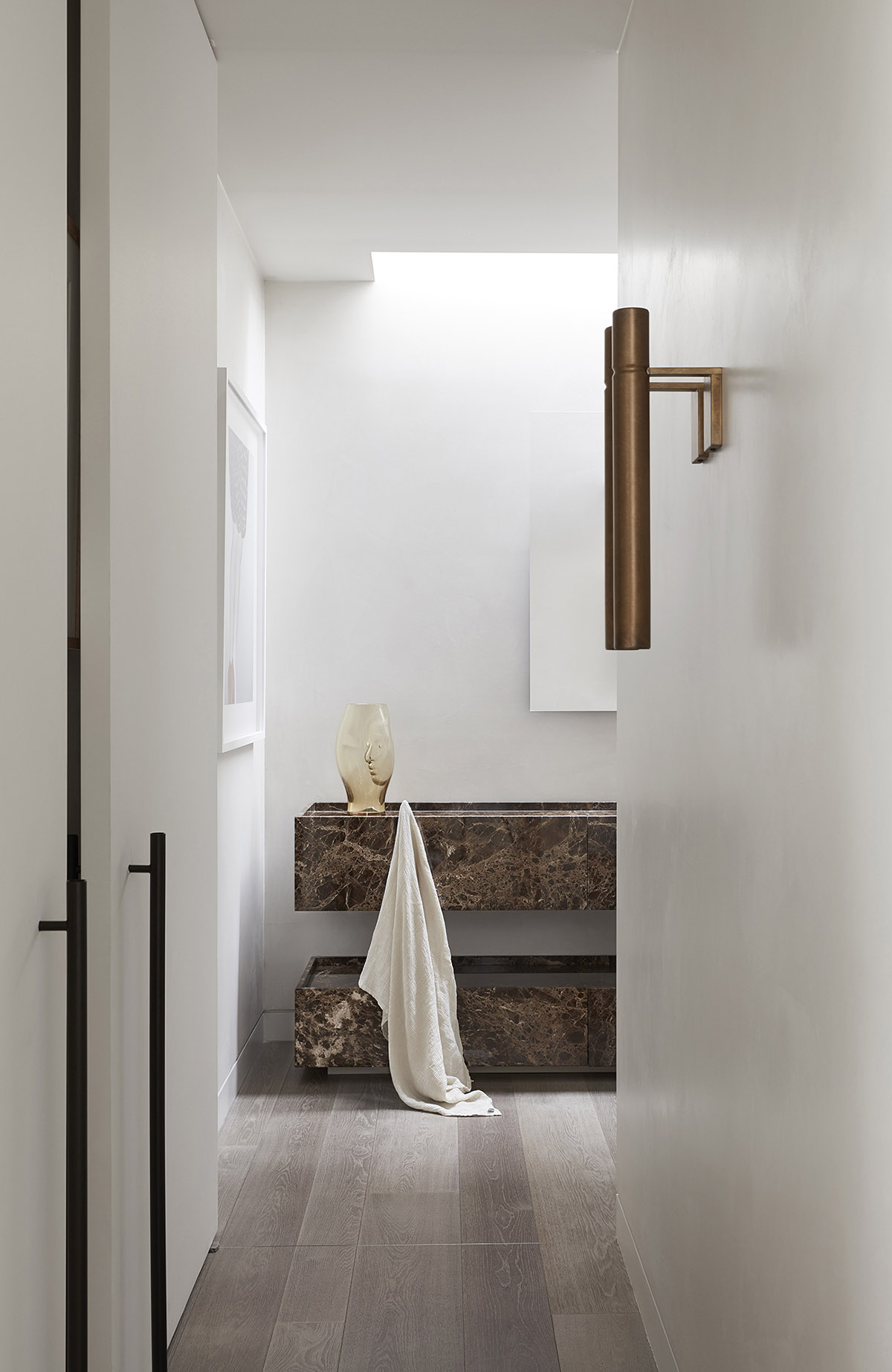 Jolson Architecture and Interiors creates fluid surfaces for interiors of this Melbourne home