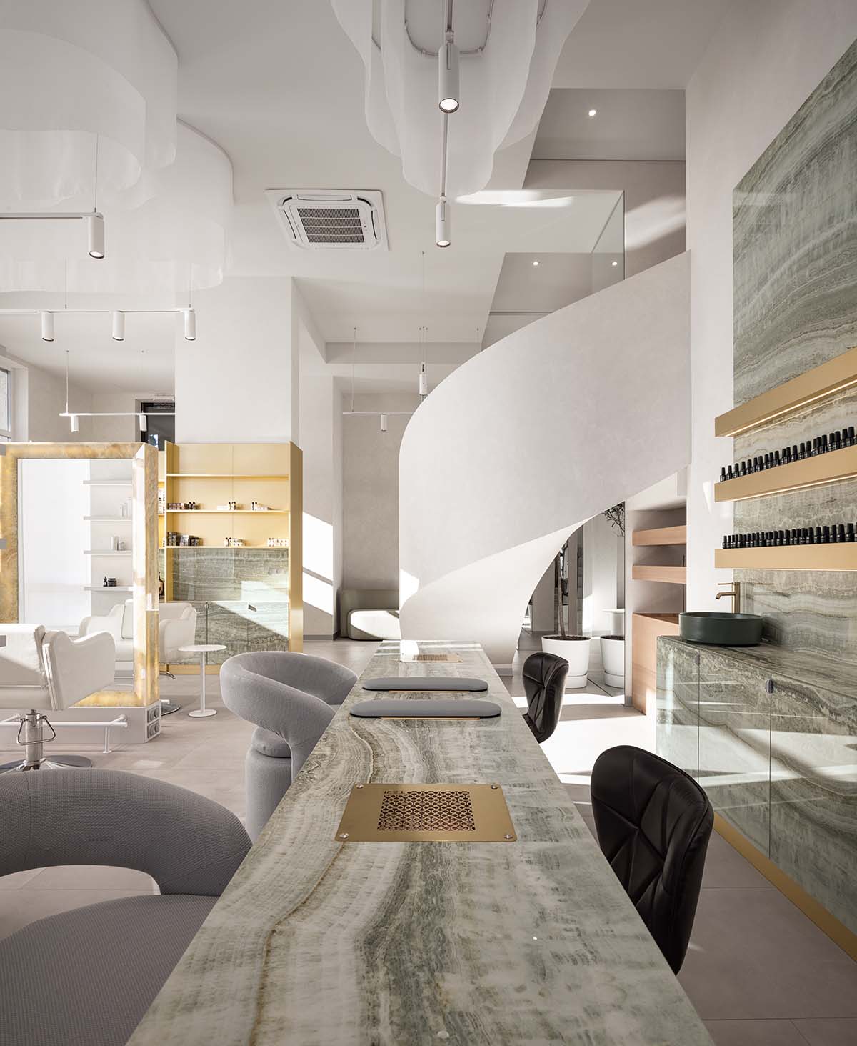 Mirrors and golden frames create a sense of care and deep comfort for beauty salon in Ukraine