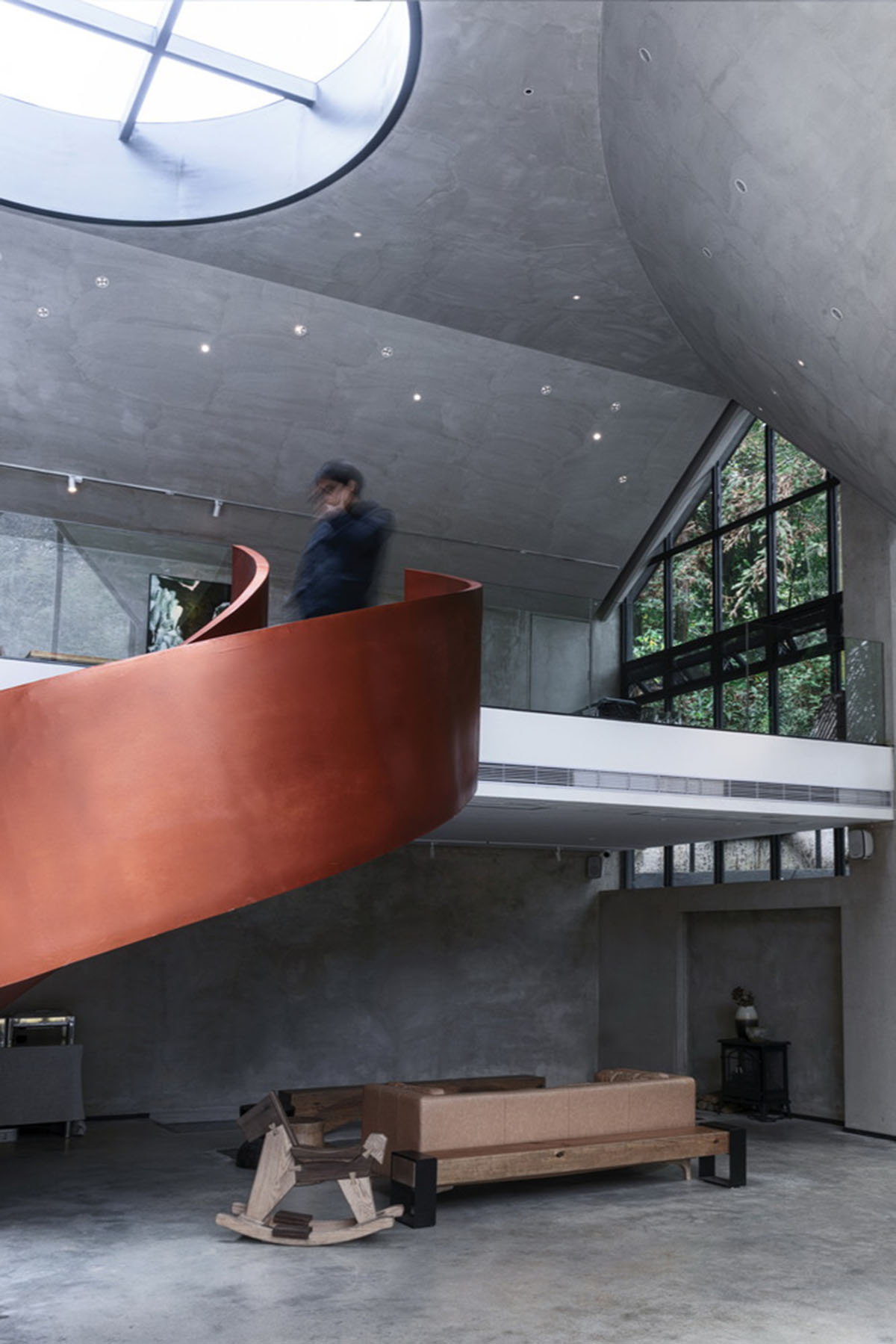 Wildurban Architects completes restaurant with cave-like roof in a forest in Huizhou, China