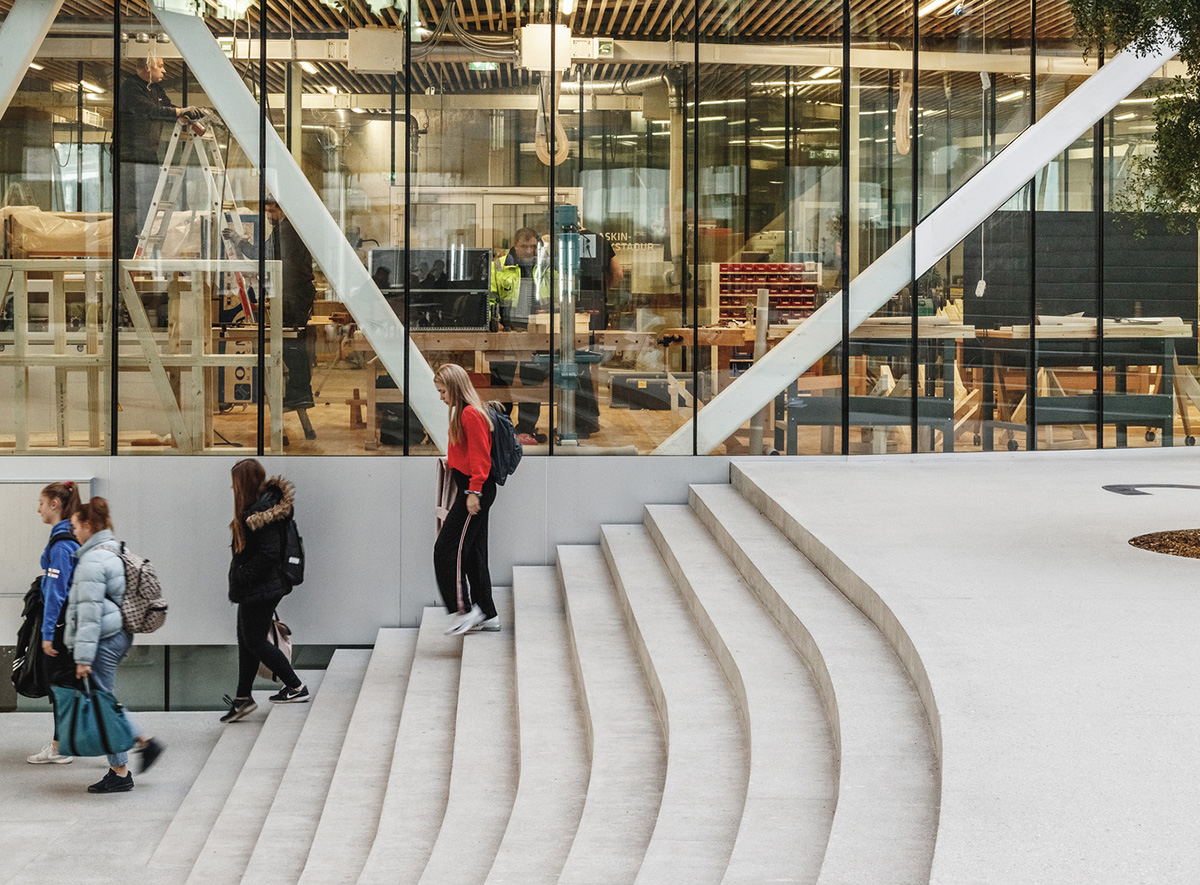BIG's vortex-shaped education center combines three schools under one roof on the Faroe Islands