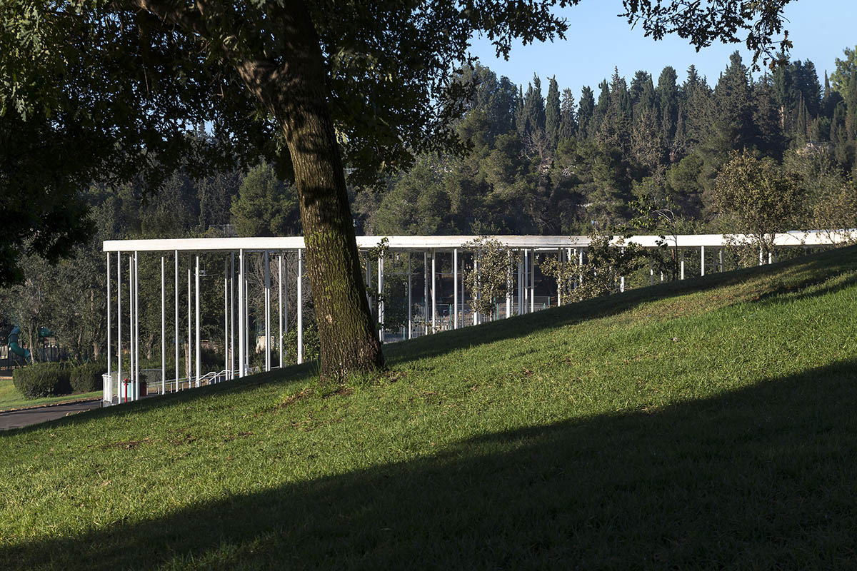 Yaniv Pardo Architects designs open coffee shop with slim columns in idyllic landscape of Jerusalem