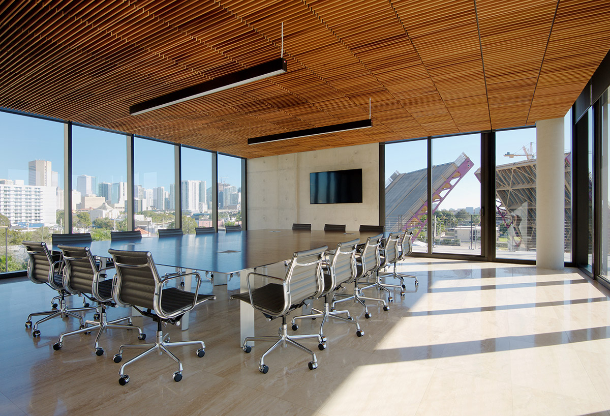 Oppenheim Architecture designs GLF Headquarters with large shifted concrete volumes in Miami river