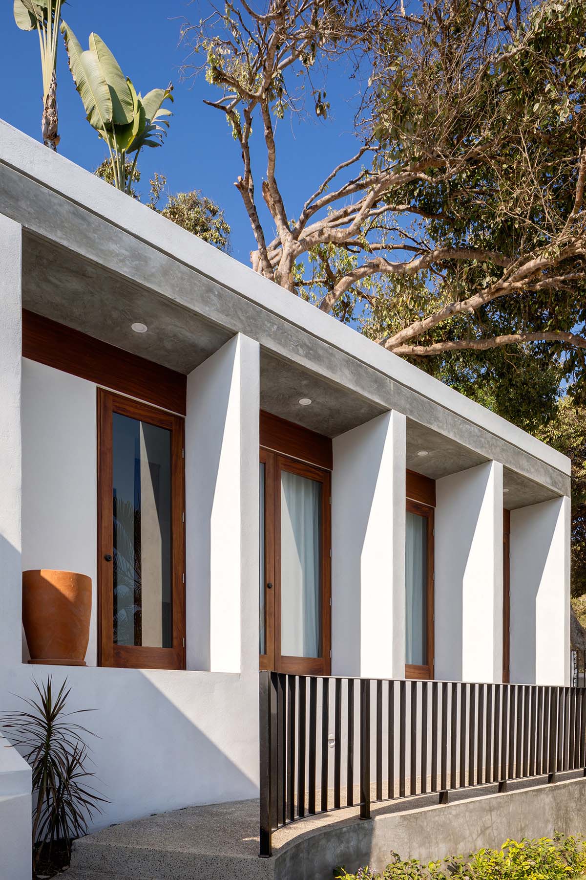 MAIN OFFICE's family house blends into the tropical landscape of a surfers' town in Mexico