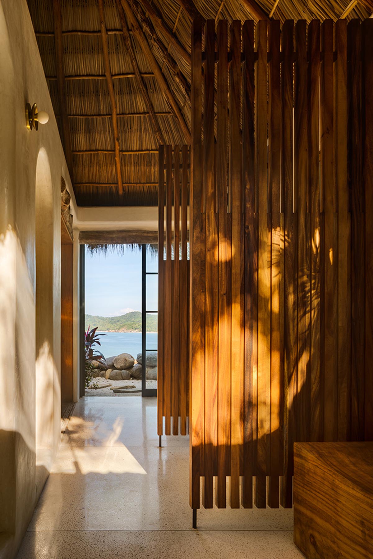 MAIN OFFICE adds half-circle yoga platform to thatched-roof guest villas in Sayulita, Mexico