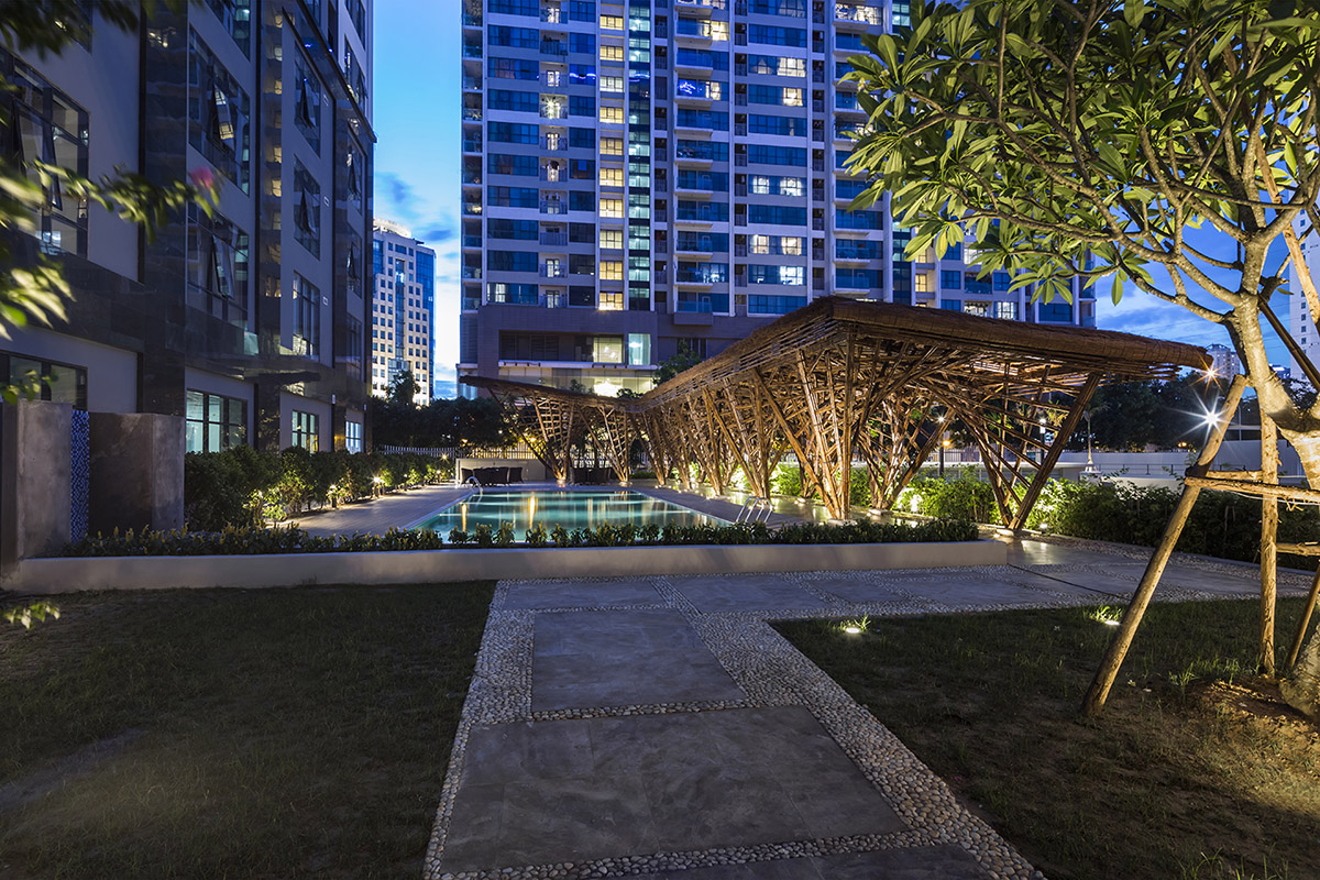 VTN Architects' Vinata Bamboo Pavilion creates a natural pathway in a garden of high-rise buildings