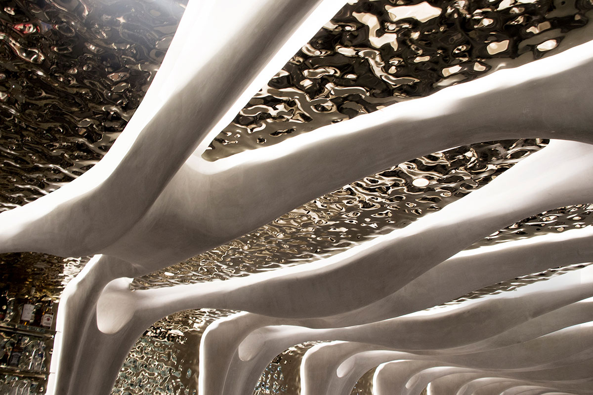 CAA Architects creates flower-like double-deck terrace in the interior of restaurant in Beijing