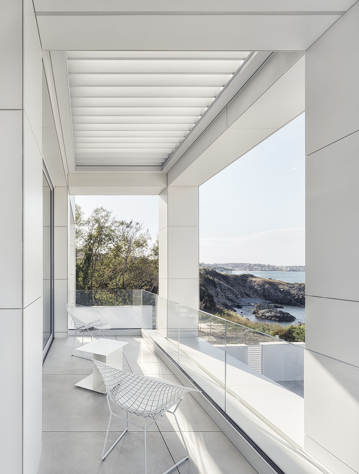 Simple Architecture renovates old house with gridded fa&ccedil;ade in Bulgaria