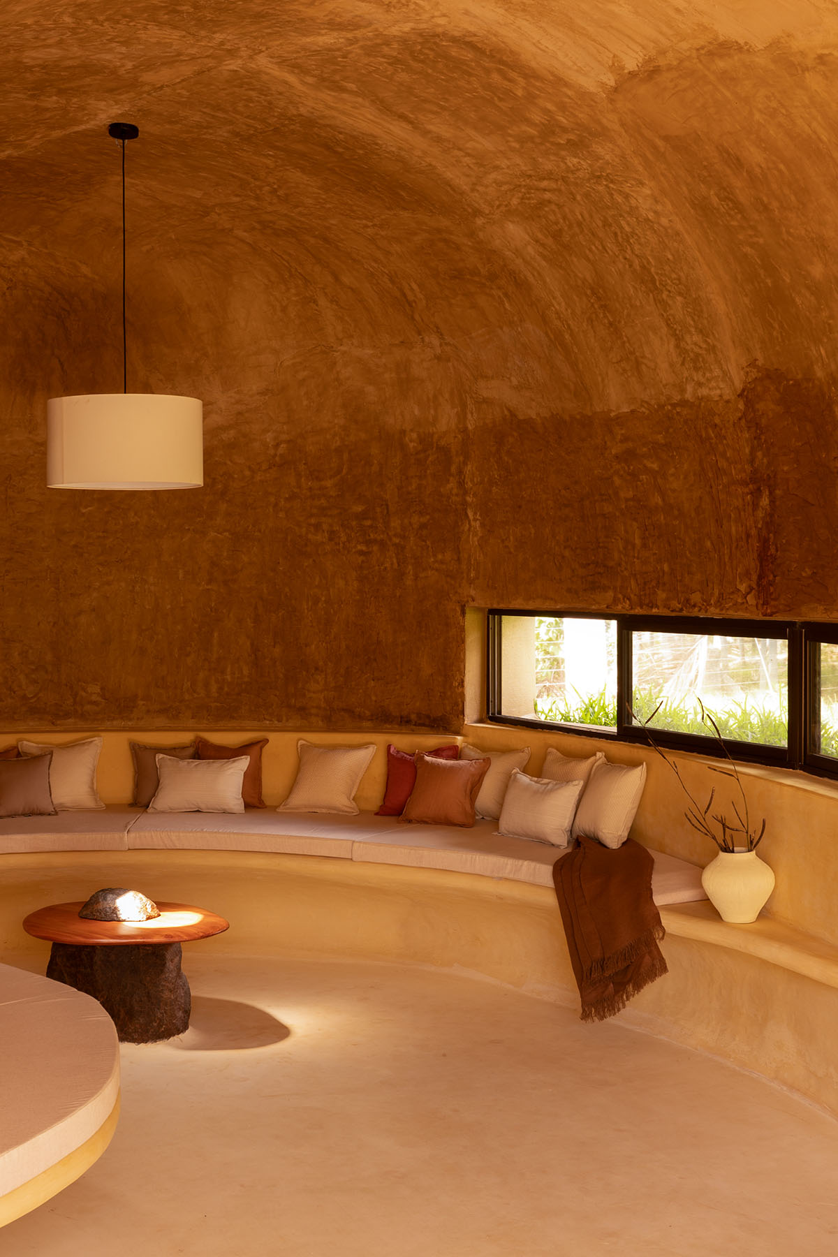 Cave-like farmhouse by Earthscape Studio provokes 