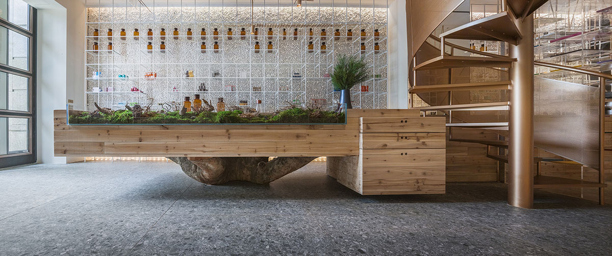 This pharmacy features varied spaces to experience different curing processes in artful environment
