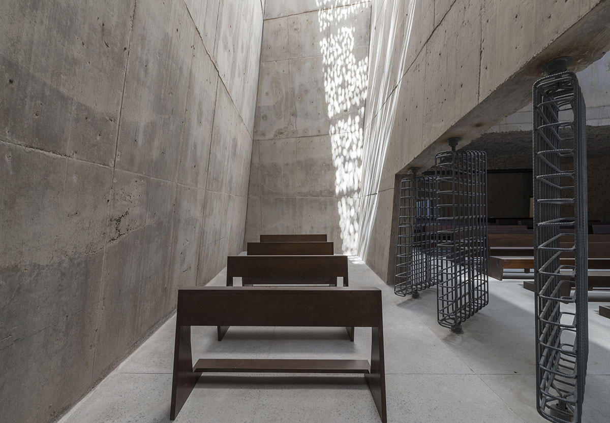 Menis Arquitectos designs church and community centre in Spain with four massive concrete volumes 