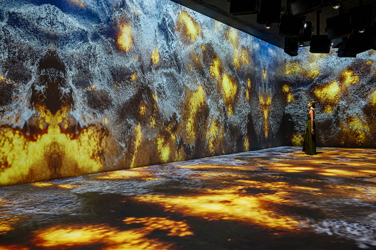 Grey fluid concrete wraps Aatma Manthan Museum by Sanjay Puri Architects