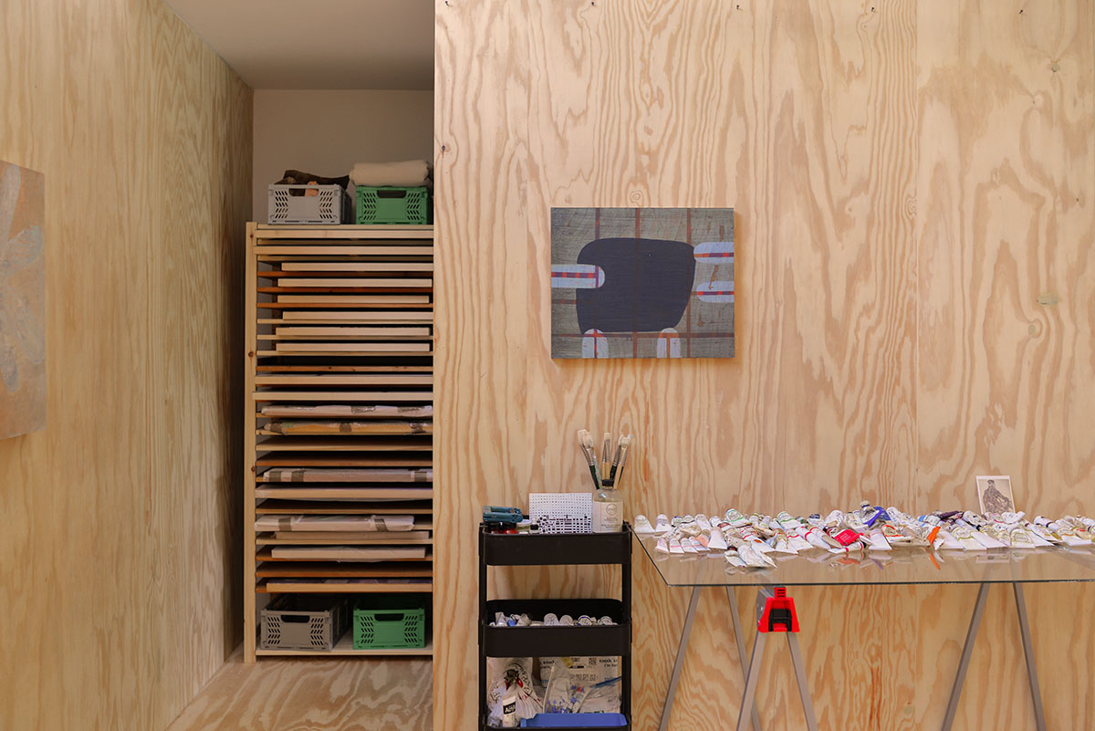 An artist's studio floats and illuminates in the landscape in Germantown