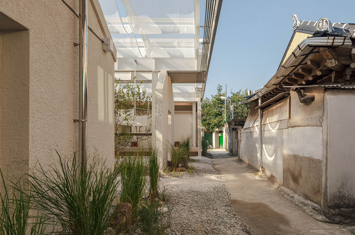 one-aftr converts old factory buildings into a fragmented cafe in South Korea
