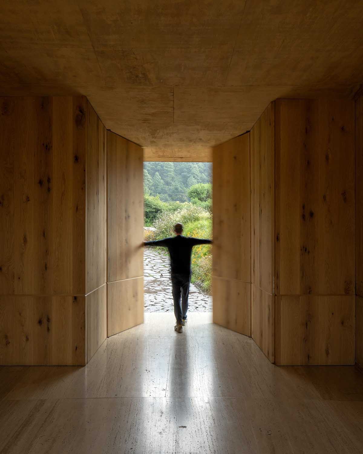 Fernanda Canales creates a circular home framing a mountain and a volcano in Mexico