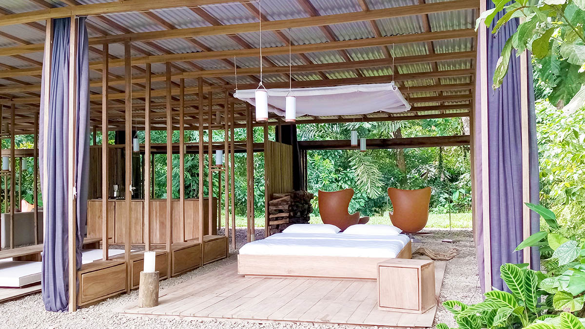 Open Jungle House by Ksymena Borczynska is wrapped by curtains and in Costa Rica 