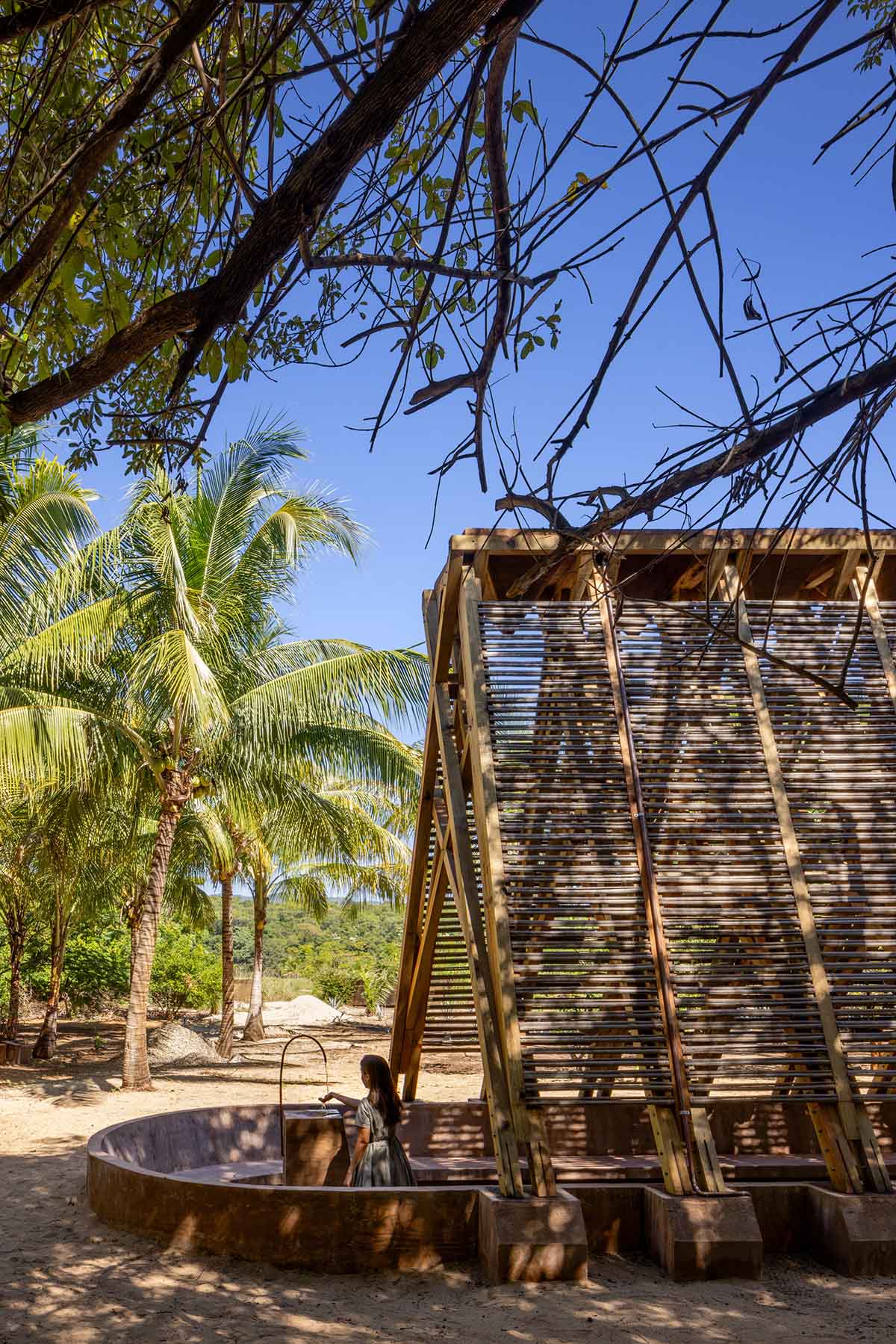 Centro de Colaboración Arquitectónica completes wooden Orchid Pavilion for Casa Wabi in Mexico